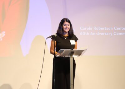 CEO and President of the Carole Robertson Center standing at a podium